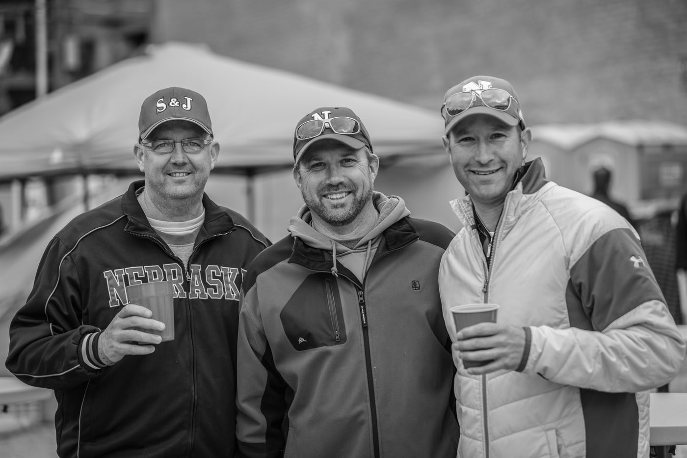 Event attendee group portrait in black and white.