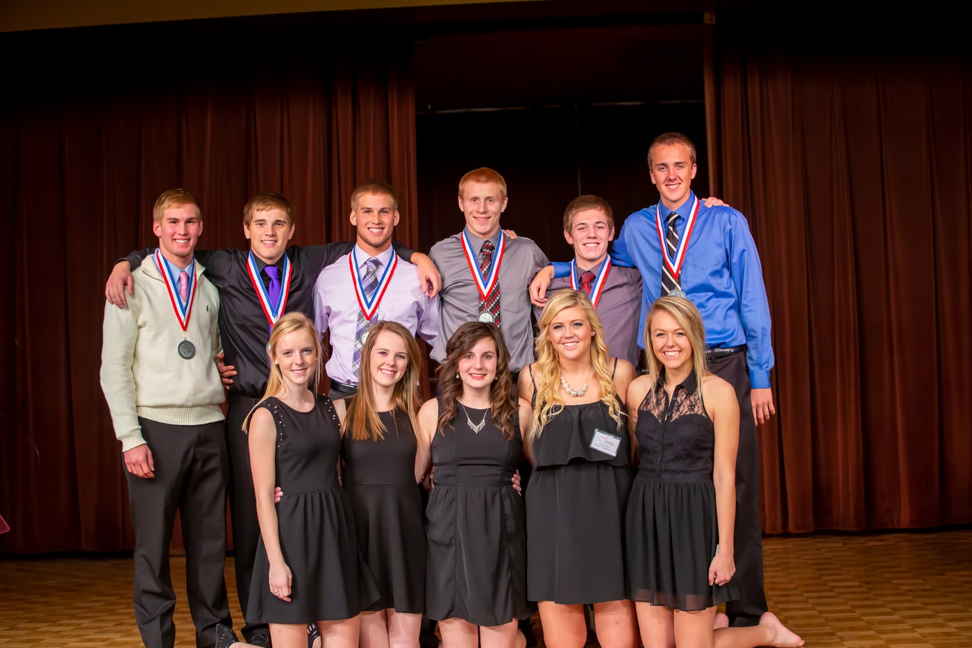Event award group portrait with polished stage delivery.