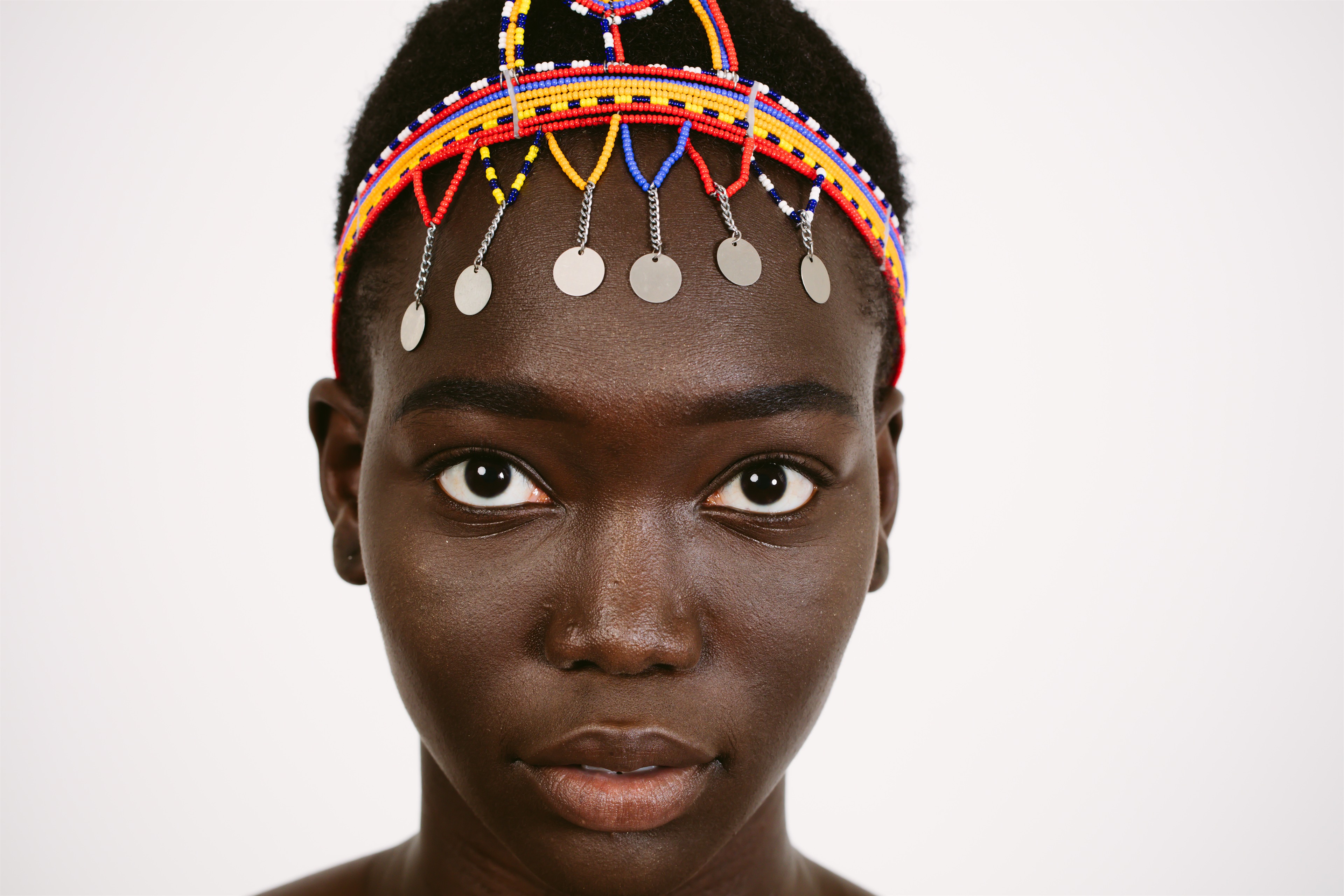 Fine-art portrait direct gaze, gallery-grade homepage opener.