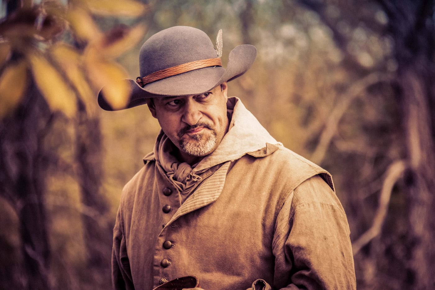 Rugged cowboy character portrait, cinematic, textured.