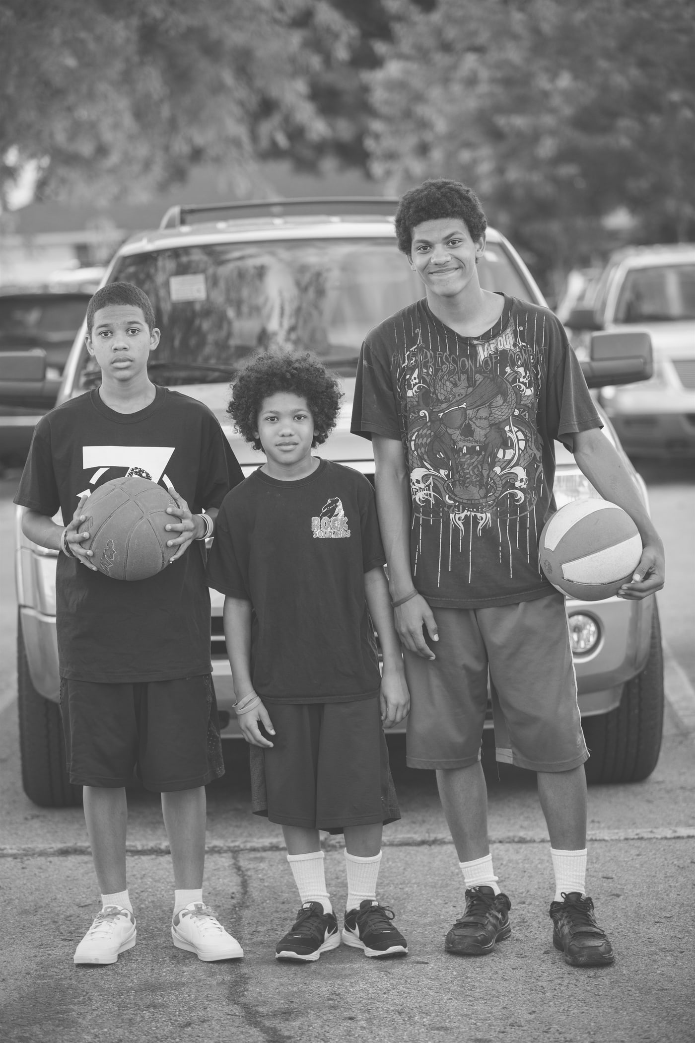 Black-and-white youth sports portrait.