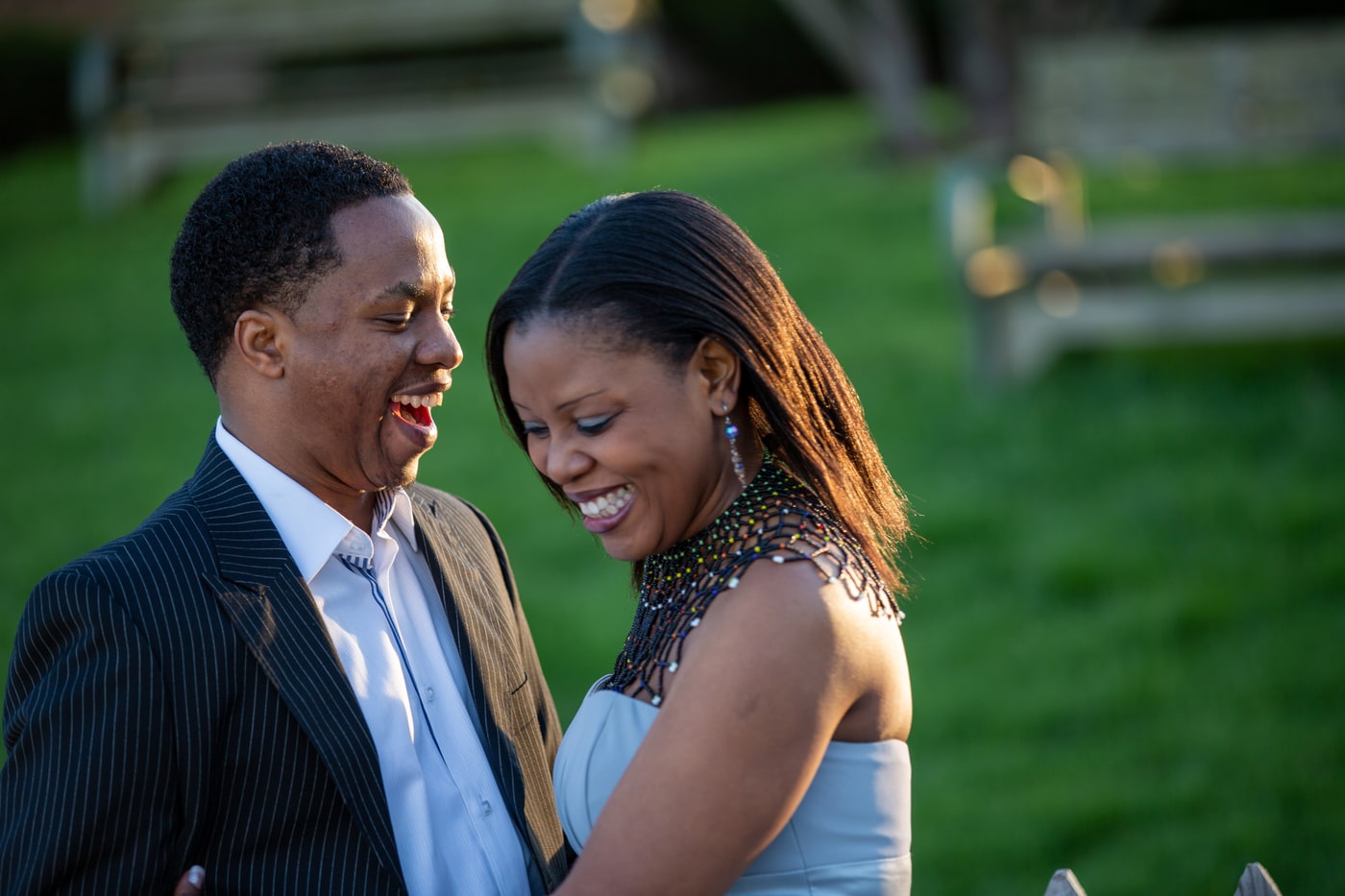 Engagement portrait with warm connection and clean outdoor light.