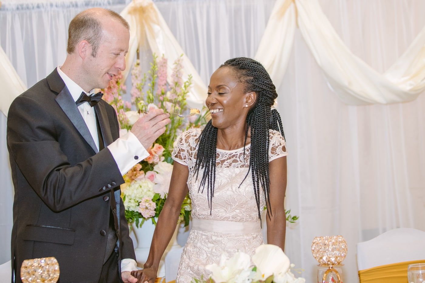 Wedding ceremony connection with clean altar framing.